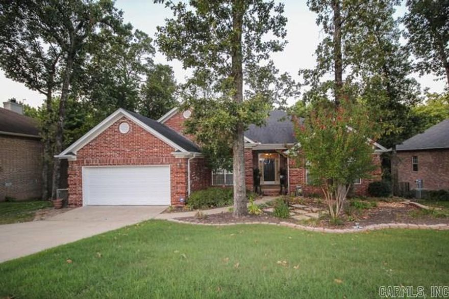 NEW Hardwoods in this beautiful 3 bedroom, 2 bath home and separate office with a spacious living room, gas fireplace and surround sound. This home also includes a beautiful dining room, an office, and a laundry room with additional storage and an eat-in kitchen. Large master bedroom and bathroom which has double vanities, Jacuzzi bathtub, stand-up shower, and a walk-in closet. Wonderful deck off the back of the house that overlooks five-mile creek provides privacy. Call to see it today!