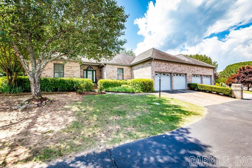 Within walking distance to Greers Ferry Lake.  3 Bedroom, 2.5 baths of comfortable living.  Vaulted ceiling in the living, separate dining, kitchen with breakfast room.  Covered back porch.  Small back yard.  Main bedroom has sitting area, bath, walkin in closet and patio doors going onto back porch.  Great location.