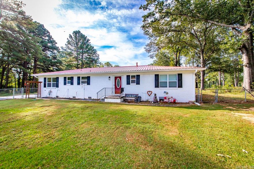 Looking for land and to live just outside the city limits but close to town, close to I-67/57 & LRAFB. This remodeled Kitchen will amaze & delight! Metal roof, new flooring, new paint, 2 stunning bathrooms and 2 bedrooms. Would make a great first time home buyer, AIRBNB for the Wedding Venue across the street! There is an unfinished tiny home on the property that you can put your personal touches on and have investment property and live in the main house! So many options! *sq ft approx, plz measure. The acreage is 3.3 +/- survey recommended