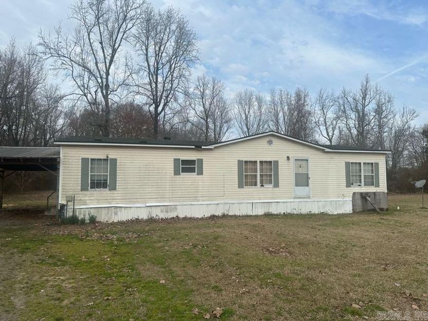 BACK ON MARKET DUE TO NO FAULT OF THE SELLER!!!!   Quiet country living in Lonoke! This 3-bedroom, 2-bath manufactured home sits on roughly 2 acres (acreage determined by parcel boundary measurements from county records). The home offers comfortable living with space to spread out and enjoy the peaceful surroundings. Please note: washer, dryer, fridge, stove, security cameras, grills, gun safe, shed, trampoline, swing set, and space heaters do not convey. Seller is offering a $500 credit toward a new stove. Property is being sold as-is. No seller property disclosure. Buyers should verify and calculate lot size using their own measurements.