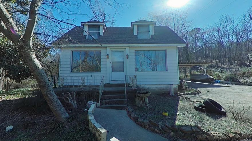 Rare opportunity for 2.43 acres in town of North Little Rock with endless possibilities.  This 1930's gem has a long history of same family ownership and was unfortunately damaged by the March 2023 tornado.  The home and detached garage will convey at zero value and the property is being sold "as is".  Great location right by Burns Park which is full of a multitude of outdoor and sports activities from golf, playgrounds, trails, tennis, and much much more.  The home sits on one and a half acres that's not in a subdivision and the adjacent .93 acres is in a subdivision backing to Sierra Madre Dr.  Build a dream home for yourself or develop to build several dream homes for others.  Please see Agent Remarks for important showing information and instructions.  Also see MLS #24005555