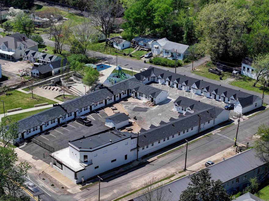A hybrid investment opportunity in the heart of one of Arkansas’s most vibrant tourism destinations! This beautifully renovated 30 unit apartment complex offers the best of both worlds: consistent long-term rental income paired with the lucrative upside of Air BNB units and a 2,000sqft updated on-site leasing office—perfect for self-management. Convenience is at your fingertips, as the apartment is just minutes away from local cafes, restaurants, art galleries, entertainment venues and the David F. Watkins Memorial Park. No seller financing! AGENTS - SEE REMARKS!