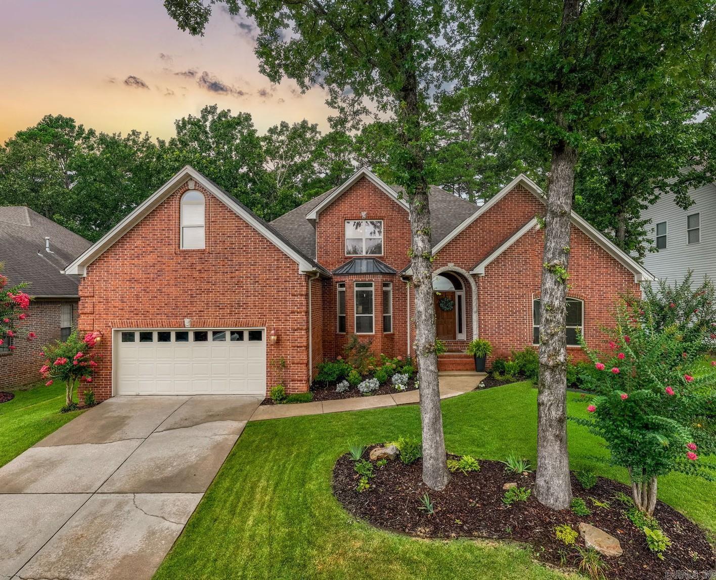 Beautiful traditional home in West Little Rock neighborhood. Spacious 4 bedroom with 4 full baths. Home has had numerous updates, including a recent kitchen update, home was freshly painted (2023), new kitchen subway tiles (2024), new fireplace tiles (2024), and a new, fully enclosed backyard fence (2023). Best of all, it has a very large, flat backyardāperfect for sports, kids, entertaining friends, and grilling. This light-filled, window-rich home has a modern, open floor plan with an elegant entry and formal dining area. Large family room with fireplace and access to covered terrace. Gourmet kitchen has top-of-the-line appliances, designer backsplash, granite countertops, custom cabinetry, and large central island. Spa-inspired primary suite on the main level and additional guest suite/office with full bath. Upstairs two large bedrooms with shared bath and a very large playroom/5th bedroom with full bath. Excellent storage, large walk-in attic, and two blocks to the POA pool, park, and pickleball courts.