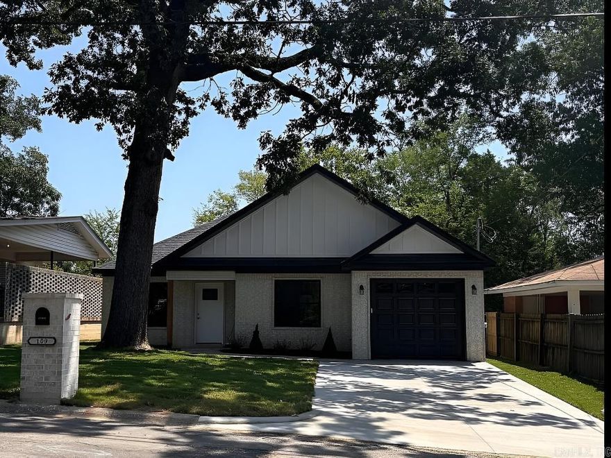Welcome to this beautifully built new construction 3-bedroom, 2-bath home in the heart of Hot Springs, Arkansas. Thoughtfully designed for comfort, efficiency, and modern living, this home features an exceptionally energy-efficient build, with the entire structure—including the attic and garage—fully contained within the thermal envelope. This design promotes consistent indoor temperatures year-round while helping reduce utility costs. The open, functional floor plan offers a welcoming living area that flows seamlessly into the kitchen and dining space, ideal for both everyday living and entertaining. The kitchen is fully equipped with brand-new appliances, ample cabinetry, and modern finishes that blend style and functionality. The primary suite provides a private retreat with an en suite bathroom and generous closet space, while two additional bedrooms offer flexibility for family, guests, or a home office. Outside, enjoy a privacy-fenced backyard perfect for pets or outdoor activities, along with a covered patio ideal for morning coffee or evening relaxation. This move-in-ready home combines quality construction, thoughtful design, and energy-efficient living.