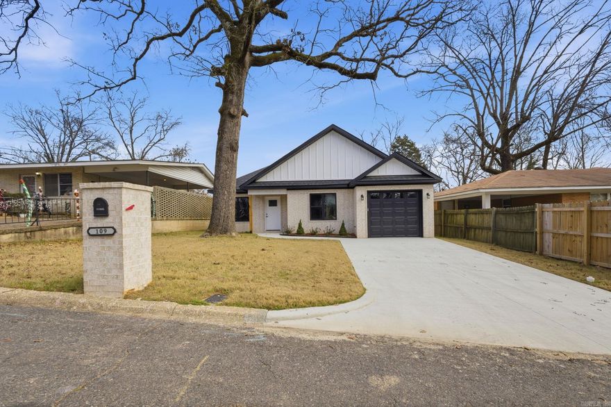 Welcome to this beautifully built new construction 3-bedroom, 2-bath home in the heart of Hot Springs, Arkansas. Thoughtfully designed for comfort, efficiency, and modern living, this home features an exceptionally energy-efficient build, with the entire structure—including the attic and garage—fully contained within the thermal envelope. This design promotes consistent indoor temperatures year-round while helping reduce utility costs. The open, functional floor plan offers a welcoming living area that flows seamlessly into the kitchen and dining space, ideal for both everyday living and entertaining. The kitchen is fully equipped with brand-new appliances, ample cabinetry, and modern finishes that blend style and functionality. The primary suite provides a private retreat with an en suite bathroom and generous closet space, while two additional bedrooms offer flexibility for family, guests, or a home office. Outside, enjoy a privacy-fenced backyard perfect for pets or outdoor activities, along with a covered patio ideal for morning coffee or evening relaxation. This move-in-ready home combines quality construction, thoughtful design, and energy-efficient living.