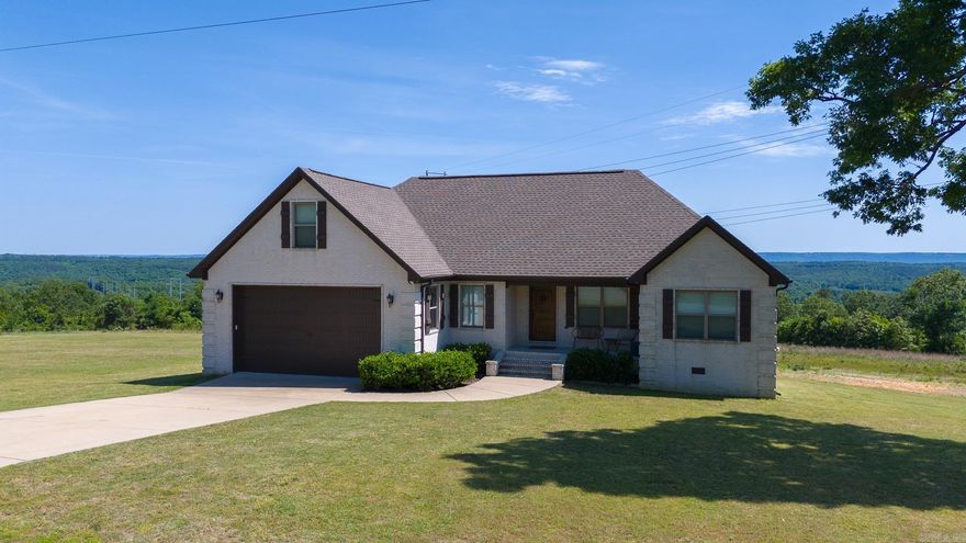 GO JUMP IN THE LAKE! Savor the sun and the VIEW from your back deck. Located a golf card ride away from Hilltop Marina this 3-bedroom, 3-bathroom home with a BONUS ROOM will entertain family and friends for ALL SEASONS! Open the door to your centrally located living room featuring a wall of windows, LVP flooring and a COMMANDING VIEW. Everything a cook could want in this STEP SAVER kitchen with an island, walk-in pantry, stainless appliances and quartz counters. Primary suite with an in-suite bath/dressing area includes double vanities, a tile walk-in shower and bathtub. 2 additional bedrooms and another full bath provide plenty of room for PLAY AND SLEEP. The upstairs PARTY SIZED rec room with another full bath could serve as a game-room, exercise room, home office OR additional BEDROOM! ANOTHER PERK, foam insulation in the walls and roof deck for added insulation. Don't miss your opportunity to see this SCENICALLY SUPREME property!