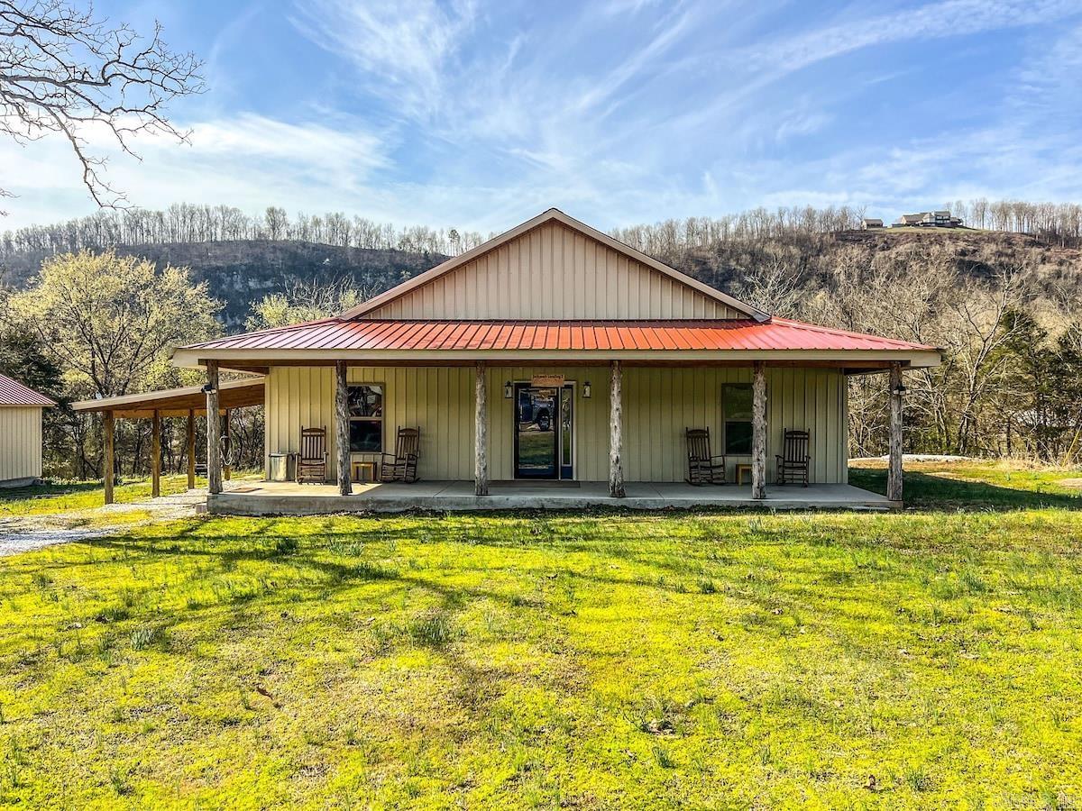 This is a newer built 3-bedroom, 2-bathroom cabin. It features a vaulted ceiling, screened in porch, generator, a 30'x24' shop, and much more! This property was used as a nightly rental property and will come fully furnished and could generate income immediately. Would also make a great primary resident, or personal vacation cabin as well as a rental property. The cabin is located just a short drive from the White River. Is also close to the town of Mountain View, and all the amenities the town has to offer. Including The Ozark Folk Center State Park, Blanchard Springs Caverns, shopping, restaurants, a movie theater, and much more! This is a must-see property, give us a call today to set up an appointment to come take a look for yourself!