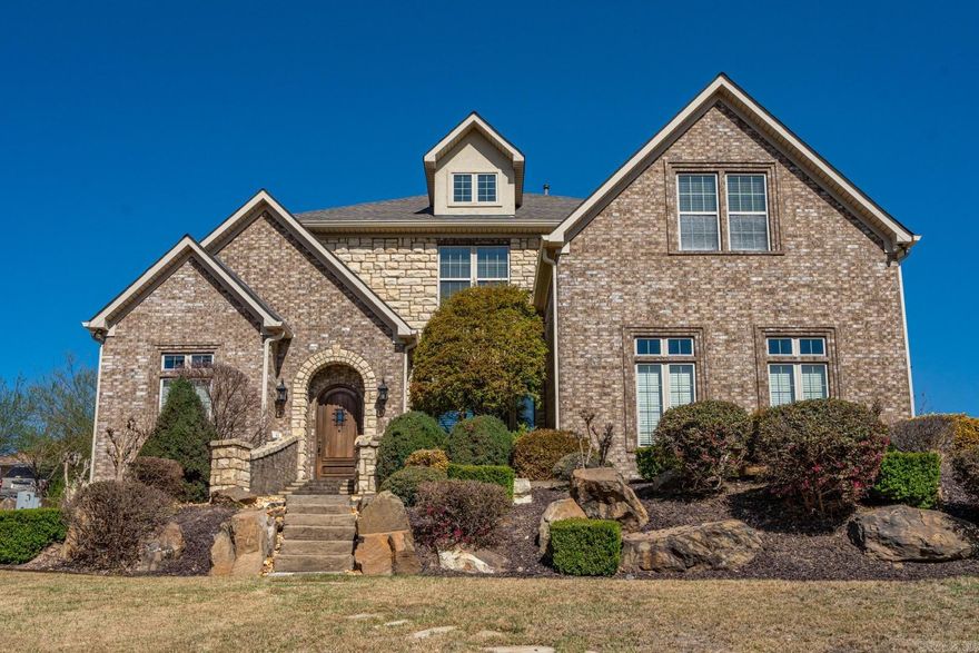Welcome to your dream lakefront retreat in the prestigious gated community of Lake Forest Shores. This exquisite 4-bed, 3.5-bath home offers elegance, comfort, and modern convenience, with year-round deep-water access and breathtaking panoramic lake views. Step inside and be captivated by the soaring 24ft ceilings, providing an abundance of natural light. The gourmet kitchen is a chef’s paradise, featuring top-of-the-line Thermador appliances, custom cabinetry, and premium finishes. Enjoy outdoor living at its finest with 3 expansive decks boasting brand-new Trex decking, perfect for hosting family and friends. A covered double boat dock with lifts makes lake days effortless, while the tram to the water ensures easy access. In the evenings, gather around the fire pit and soak in the serene surroundings. This home features a whole home generator. The luxurious primary suite is a true sanctuary, offering stunning lake views, a spa-like bath with dual showerheads and ample closet space. Storage is never an issue with plenty of built-ins and a spacious 3-car garage. The beautifully landscaped yard adds to the home’s curb appeal, creating a private oasis you’ll never want to leave.