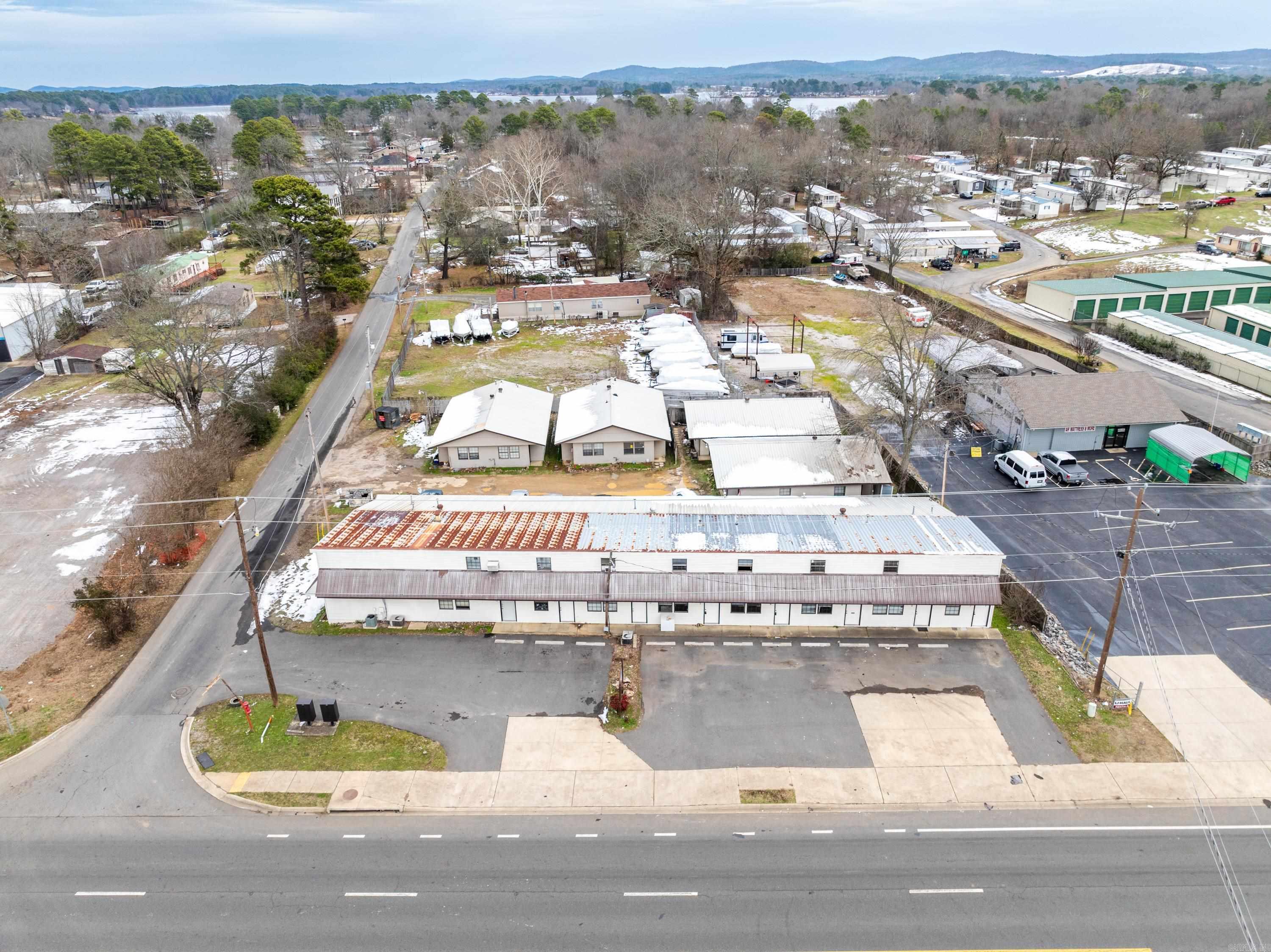THERE ARE A TOTAL OF 6 PROPERTIES COMBINED IN TO ONE PRICE. GREAT INVESTMENT FOR YOUR PORTFOLIO! 5703 CENTRAL AVENUE CONSISTS OF 19 SEPERATE UNITS 121 SECOND STREET CONSISTS OF 6 UNITS 207 BELLVIEW A RESIDENTIAL HOUSE 207 SELLERS 2 LOTS (currently has a mobile home on it) 0 BELLVIEW 1 LOT 0 HIGHLAND 2 LOTS ALL OF THESE ARE IN HOT SPRINGS AND LISTED INDIVIDUALLY IN THE MLS BUT WILL SELL AS A PACKAGE!