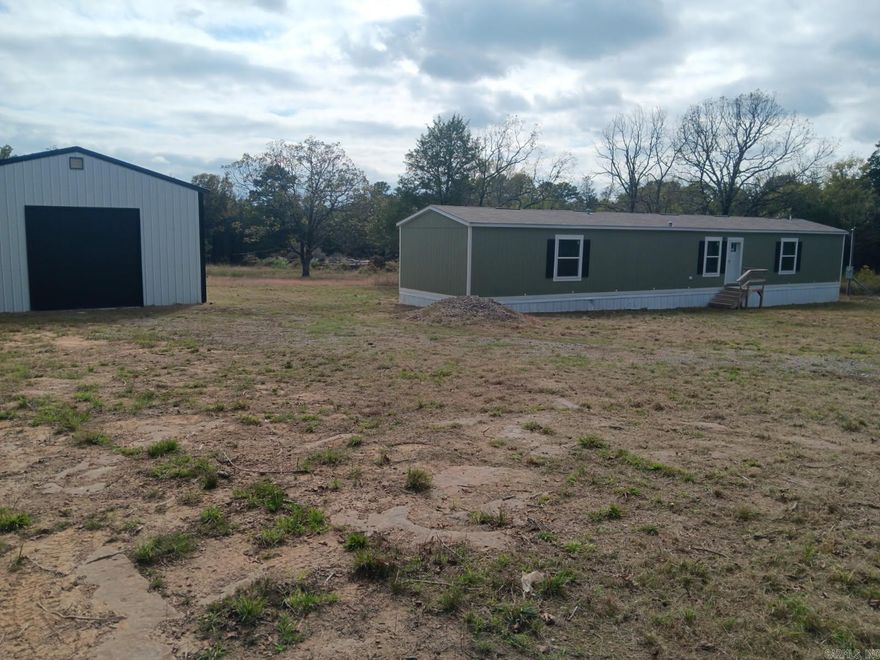 Welcome to your peaceful country retreat on 7.9 acres just outside Charleston! This beautiful 2024 manufactured home offers modern comfort and open-concept living with 2 spacious bedrooms and 2 full baths. The light-filled kitchen features stylish cabinetry, an island perfect for entertaining. plenty of room for outdoor living, gardening, or adding a shop or barn. easy access to town amenities Whether you are looking for a new homestead or weekend getaway, this move-in ready property blends modern living with rural charm.