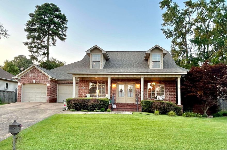 Built in 2005, this beautiful, comfortable and well-maintained home has a lot to offer.   Recent updates include NEW ARCHITECTURAL ROOF SHINGLES,  BEAUTIFUL NEUTRAL LAMINATE FLOORING in main areas and primary bedroom, MODERN 12X18 CERAMIC TILES in kitchen and FRESH PAINT IN RELAXING WARM TONES in main areas.   The kitchen is a cook's dream featuring a gas multi-burner cooktop and griddle with double oven, one side is a convection.   The kitchen also features beautifully crafted, stained cabinetry from floor to ceiling.   The solid granite counter tops are very spacious.  A small office with built-in desk located off kitchen could also be used as a coffee bar or pantry.   The layout of this home is very functional with large primary and on-suite on main level.   The other bedroom on main level would make a great office/study or nursery.   Full bath shared by two spacious bedrooms up, both with walk-in closets.   Laundry room with sink is located off the kitchen.   Oversized garage with 9x10 storage/workshop.   The fenced backyard is very private.   The covered back porch is great for relaxing or entertaining.   Pictures do not do this home justice.  It's a must see! c agent remarks.