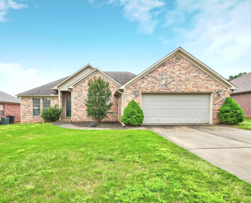 RD Eligible! Modern 3 Bedroom Home in Tranquil Neighborhood! Discover your sanctuary in this quiet neighborhood. Kitchen cabinets painted in modern color scheme, complemented by metal artisan themed backsplash w/breakfast bar. Fridge stays. Living room features cozy fireplace. Flexible space adjacent to the LR can serve as a formal dining or office, catering to your lifestyle. Large arched window floods the space with natural light. Retreat to the primary bedroom w/pan ceiling & ensuite bath w walk in closet. 2 car garage provides secure parking & additional storage space. Step outside to your private backyard retreat.  Entertain guests on covered back porch w/comfy two-seater swing, ideal for relaxation, while a wooden deck extends to an uncovered sitting area & above ground pool. New liner arriving in mid-May just in time for summer. Large exterior storage building w/ roll-up door provides ample space for equipment/tools. Enjoy peace of mind with brand new water heater and HVAC system installed in 2022, ensuring comfort and efficiency year-round. **Agents, see remarks**