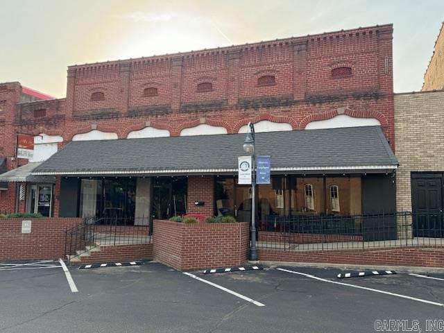 This early 1900's building has stood the test of time serving as various retail and office establishments. Surrounded by shopping, dining, professional and financial offices, and apartments, this location offers the perfect mix to support your intended use. The building is split into 2 storefronts creating the opportunity for rental income if the entire space is not needed. Unit A starts with a small storefront, currently used for music lessons, with an attached half bath. Through the interior door you will find a modern, 1 bedroom, 2 bath apartment with an open concept and 2 loft storage areas As you enter the storefront of unit B, you will come to a small lobby area with seating that guides you into a large commercial space. Behind the commercial space sits a large, open concept, 1 bedroom 1.5 bath apartment with spacious kitchen, tons of storage, a loft/second sleeping area, and upstairs storage. This apartment is currently being used by the owner for music classes. This is truly a "one of a kind" opportunity to own a piece of Pocahontas History with tons of mixed-use options. (Conditional use permits required for some types of residential rental/Airbnb/VRBO use)
