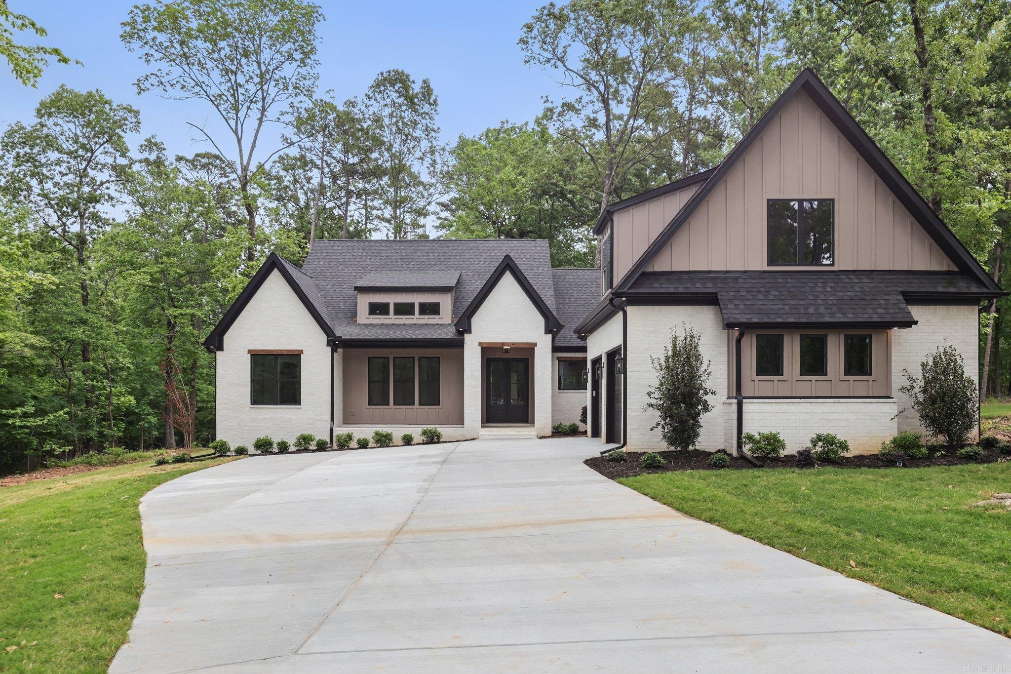 Absolute showstopper! This brand new 4-bed, 3.5-bath home is perfectly nestled on a private, wooded acre at the end of a quiet cul-de-sac. From the striking curb appeal to the thoughtfully designed interior, every detail shines with intention & luxury. Step into a spacious open-concept living area anchored by a chefās kiss of a kitchenācomplete with a large island, quartz countertops, sleek gold accents, natural gas range, and a deep sink perfectly positioned to overlook the front drive. The walk-in pantry offers generous storage and style, making entertaining effortless. The main level features a well-appointed primary suite with beautiful natural light, a makeup vanity, soaking tub, glass shower, and a custom closet with dual built-in dressers for an elevated touch. A large laundry room connects directly to the primary suite for daily ease, while a stylish half bath serves guests just off the living space. Upstairs, enjoy a spacious bonus room perfect for a movie or game roomācomplete with its own half bath for convenience. Out back, relax in your upgraded outdoor living space featuring a cozy fireplace and full kitchen setup, all surrounded by a peaceful & wooded view