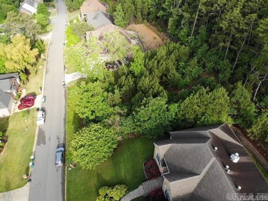 West Little Rock Lot available for under $60,000! One of last buildable lots in a fully developed subdivision w/all underground utilities. Current houses in neighborhood selling in the high 300's 400's, some over 500. No HOA fees, original covenants require 2400sf single story or 3000sf two story, no cost easy design approvals. Buy & build for immediate equity. Don’t miss this opportunity in West Little Rock!