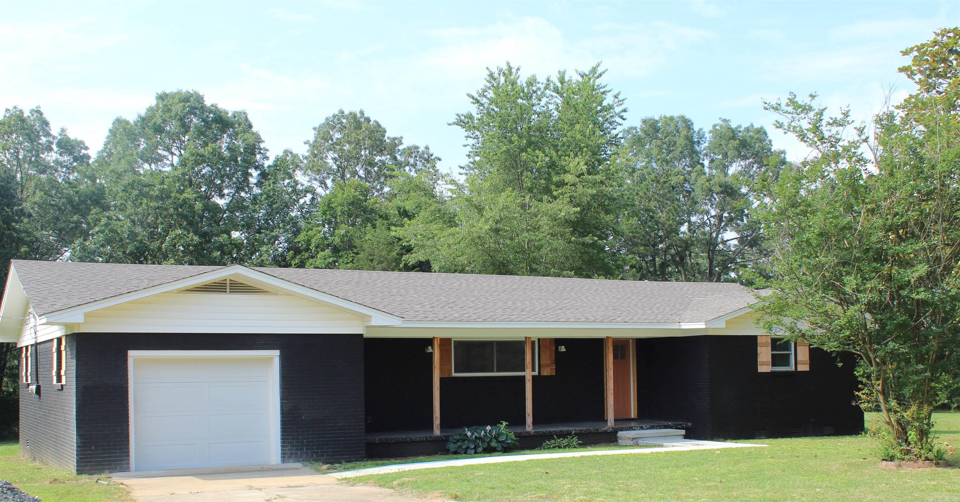 3 bed 2 bath completely remodeled brick home located just 3 miles outside of town. Nice country setting and large yard. Home features 1 car garage, new roof, waterproof luxury vinyl floors throughout, fresh paint throughout, new appliances, new light fixtures, and more.