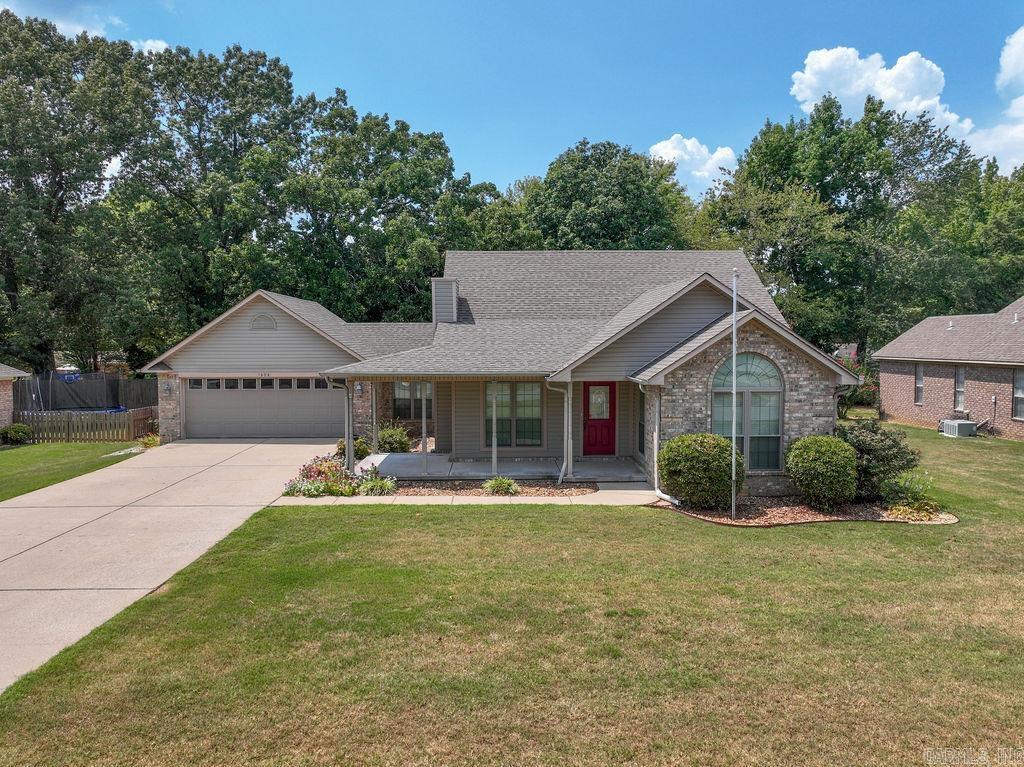 This property is situated in a highly sought-after neighborhood in Heber Springs. This 3 bedroom 2 bath home is conveniently located to area shopping, Community Center, Greers Ferry Lake and The Little Red River. Seller has made lots of improvements to includes new HVAC Trane unit, new water heater, extra insulation, walk-in shower in master, water sprinklers for lawn, new hardwood flooring and tile. Covered deck is 2 years old and roof is 5 years old. Attic access from hallway to HVAC. 8x12 storage building in the backyard and extra cabinet added to the garage for storage. This property is move-in ready and waiting on you!!