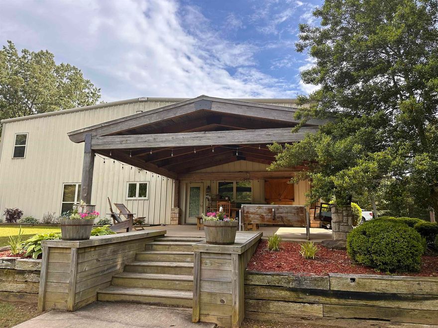 Located just 15 minutes outside of Beebe, you will find this picturesque barndominium on 5.74 acres. The wooded property lines and gated entrance allow for privacy and solitude. Once you arrive you will immediately notice the inviting outdoor entertaining area featuring a 18x36 pool with a party shack, a fire pit, and large patio space. Upon entering you will see 18 ft ceilings and a large rock fireplace in the living room. The kitchen, laundry room, and pantry are all centrally located on the 1st level. Kitchen hosts a large island, tons of cabinet space and a new dual range. Master bedroom features a walk-in closet, and master bath features a walk-in shower and whirlpool bathtub. Upstairs features include a large bonus room! Along with 2 bedrooms and walk in closets separated by a jack and jill bath. The large shop area features the safe room, a half bath, large commercial style weight room with rubber flooring & mirrors, two separate additional loft storage spaces with stair access. Enclosed dog kennel attached to a large dog run. An indoor basketball goal and lots of space for parking! Additional features listed in documents. Agents see remarks.