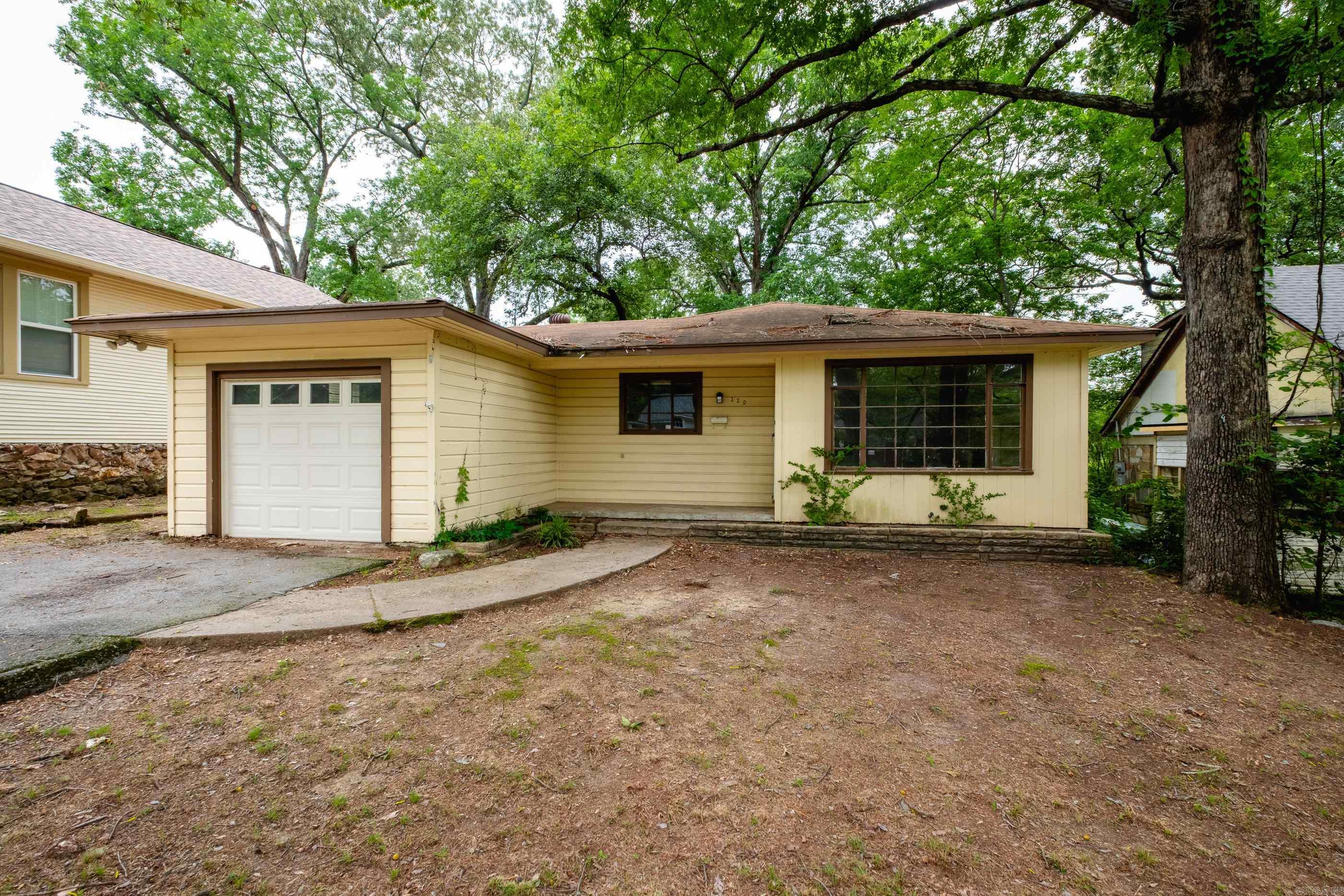 This home is located in Hillcrest and is a great opportunity. It does have original hardwoods in the Living room and bedrooms. Great sized windows , built ins in Living area, a one car garage, a level and good sized fully fenced backyard with deck. Enjoy neighborhood shopping, dining , and entertainment . Many possibilities here.