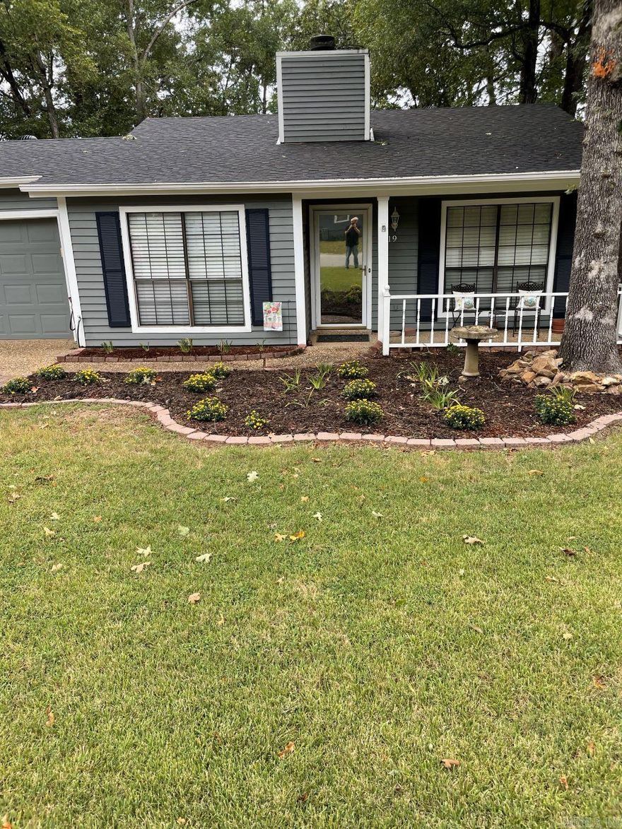 THIS IS THE HOME YOU HAVE BEEN LOOKING FOR. LOCATED IN A QUITE WELL MAINTANED NEIGHOR HOOD. THE CURRENT OWNERS HAVE PUT A NEW ROOF ON THE HOME WITH ARCHITECTURAL SHINGES,INSTALLE, A NEW HOT WATER TANK, NEW LAMINATE FLOORING AND CARPET. THE EXTERIOR OF THE HOME WAS PAINTED. ALL APPLIANCES CONVEY WITH THE HOME. THIS INCLUDUES THE WSHER , DRYER AND REFRIGAERATOR. THE 2 CAR GARAGE HAS EXTRA STORAGE SPACE AND LAUNDRY AREA. INSIDE YOU WILL FIND A DINNING AREA, A LARGE LIVING AREA WITH A FIRE PLACE WITH GAS LOGS, 2 NICE SIZE BED ROOMS. THE PRIMARY HAS A LARGE WALK IN CLOSET. THIS HOME WILL PROVIDE COMFORTABLE LIVING AND YOU CAN ENJOY THE NICE LEVEL YARD..