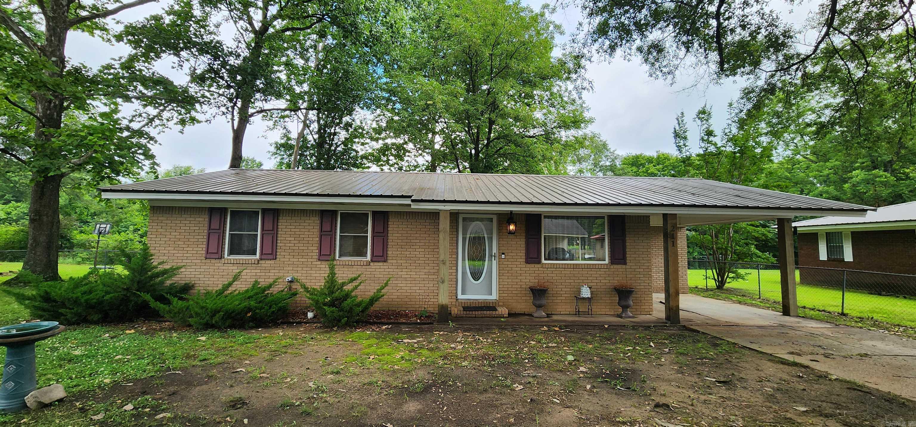Take a look at this FANTASTIC home in Woodruff Co. Updates and Upgrades galore are what you will find with this beautifully maintained property. All new within the past 6 years are the roof, HVAC, and water heater. You will not find another kitchen like what is featured in this property in this price-point. The kitchen features updated cabinets, granite countertops, and stainless appliances. The exterior of the home is equally as impressive. It features a metal roof, all brick construction, wood-wrapped columns, and an overabundance of flower beds. The backyard is beautifully shaded with mature trees and has a storage building to house all of your extra things. Inside the home features 3 bedrooms and 1 bathroom, a separate...and spacious...laundry room, a larger living room, and GORGEOUS kitchen. You will not find another home this nice and cared for in Woodruff county. Come take a look today.