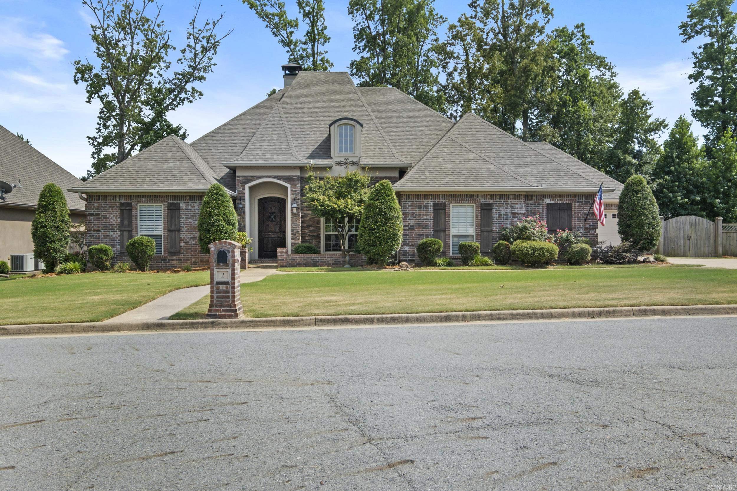 This beautifully maintained 3,200 SqFt home w/ 3-car garage is located in Maumelle’s Cypress Valley Estates addition. It offers both comfort and versatility to accommodate daily living while entertaining family & friends! It features 4 bedrooms, and 3 complete bathrooms. The master bath has a jacuzzi style tub & walk-in shower. Enjoy the charm and warmth of 3 fireplaces, including 1 in a spacious bonus room just off of the kitchen. Bonus room would be ideal for a home gym, office or flex space. Step outside to your own private retreat with an amazing outdoor living area, complete with a fireplace, in-ground salt-water pool, and built in spa that were updated this year to include a new pool liner and new water heater. Patio includes a natural gas hook up to make grilling a breeze. A patio wash-out station makes backyard clean up simple. A HOA maintained green space behind the house provides beauty and privacy. New roof added in the Fall 2024, and home features an electronic security system, and a sprinkled front lawn. Some downspouts are plumbed so water runoff empties into greenspace. House is a short walk to paved walking trails offering scenic beauty of Cypress & Maumelle