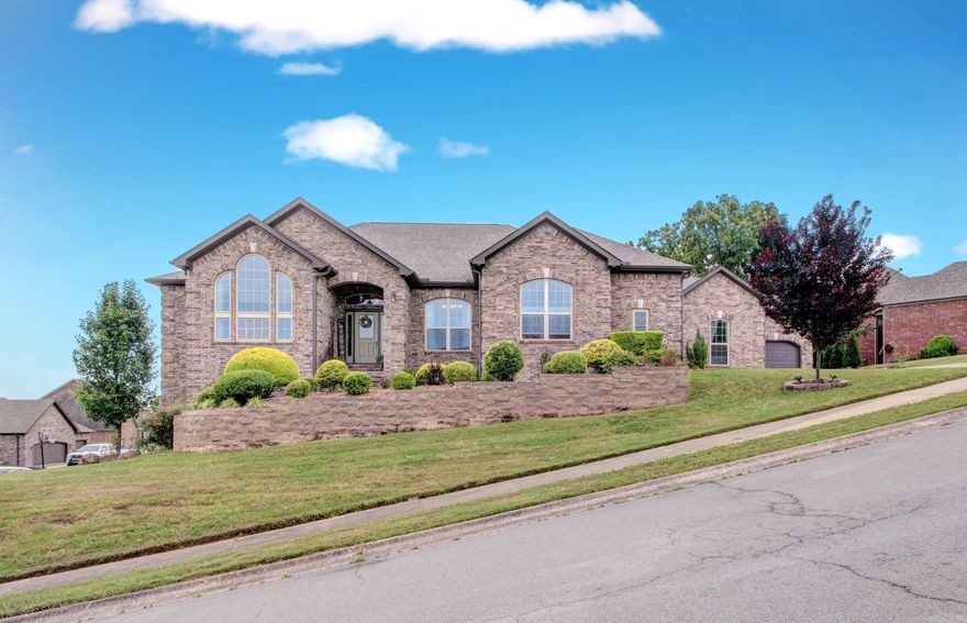 Discover unparalleled beauty at this stunning full brick, well maintained, corner lot 4 bedroom 5 bath sanctuary with curb appeal.  Feel the ultimate privacy of the split floor plan as the primary wing can be your true retreat.  The spacious ensuite features double tray ceiling, a walk in shower, double vanity, water closet, and large compartmentalized walk in closet.    The other wing boasts a junior suite perfect for multi-gen families or guests and two additional bedrooms with a full shared bath.  The heart of the home offers a cook's dream kitchen designed for gathering and entertaining with double ovens, a breakfast bar and intimate breakfast nook in addition to a dedicated dining room for special days. Two living spaces, office, a sun drenched sun room and a versatile bonus room on the second floor with bath perfect for a movie room, workout room, or your dream option.  The basement is being used as a workshop but offers additional options.  This home is in a highly desired area.  Schedule your appointment today. Agents please see agent remarks