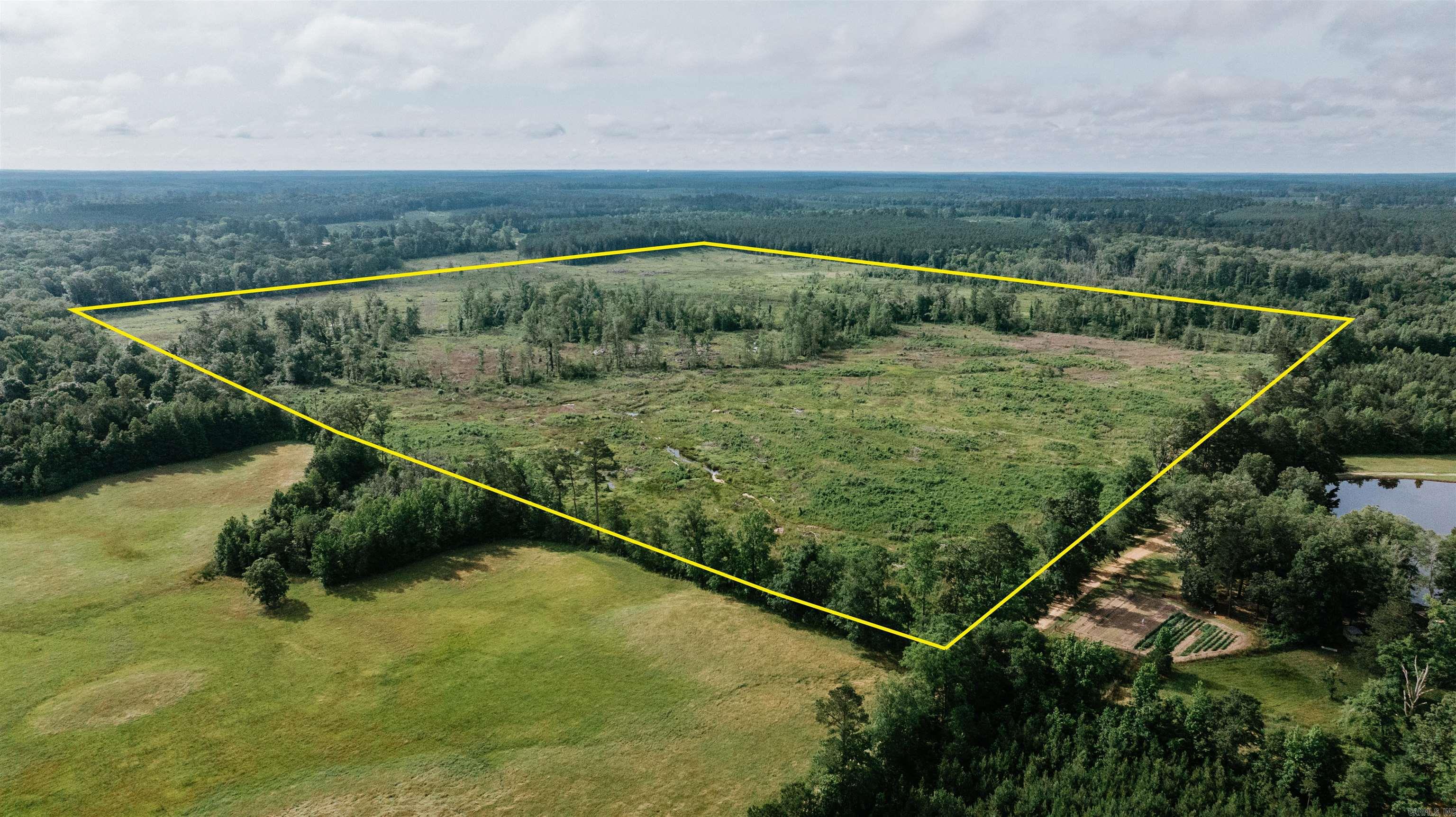 This 160 +/- acre tract just southwest of Lisbon, Arkansas, offers a rare chance to shape a recreational and wildlife haven from the ground up. Recently clear-cut (about two years ago), the property is now beginning to regenerate naturally with early successional hardwoods, making it an ideal setting for whitetail and small game habitat. The blank-slate nature of this land gives you full control to carve in food plots, trail systems, bedding cover, and stand locations exactly where you want them. Whether youāre looking for a weekend hunting retreat or a long-term timber investment, this place checks the boxes. The natural hardwood regrowth already underway will provide strong wildlife cover and future timber value without the cost of replanting. With gently rolling terrain and good access, itās a great fit for ATVs, hiking, or just exploring the woods with friends and family. Priced right and loaded with potential, this is the kind of ground that doesnāt stay on the market long.