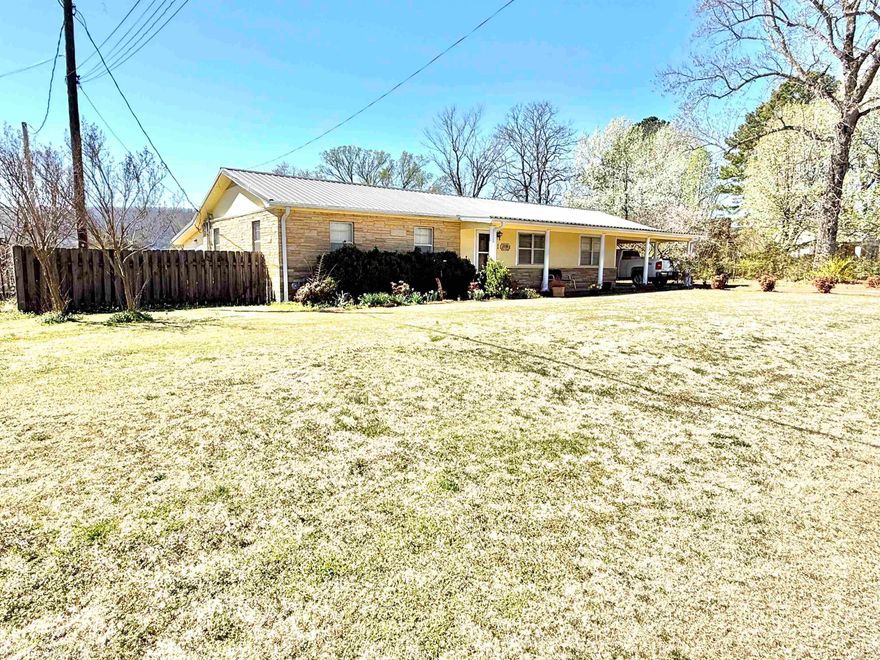 This spacious 4-bedroom, 2-bathroom home sits on a large 0.75-acre lot in the town of Mountain View, AR, with convenient access from two paved roads.  Offering 2,352 sq. ft. of living space, the home features updated flooring, a bonus sunroom, a dedicated laundry room.  Additionally, there is a detached 1,288 sq. ft. shop with a wood furnace, ideal for woodworking, but could easily be converted into a separate living space.  Additional highlights include a metal roof, a fenced yard for added privacy, and a storm shelter for peace of mind.  This property offers endless possibilities in a prime in-town location, now listed for only 319,900!