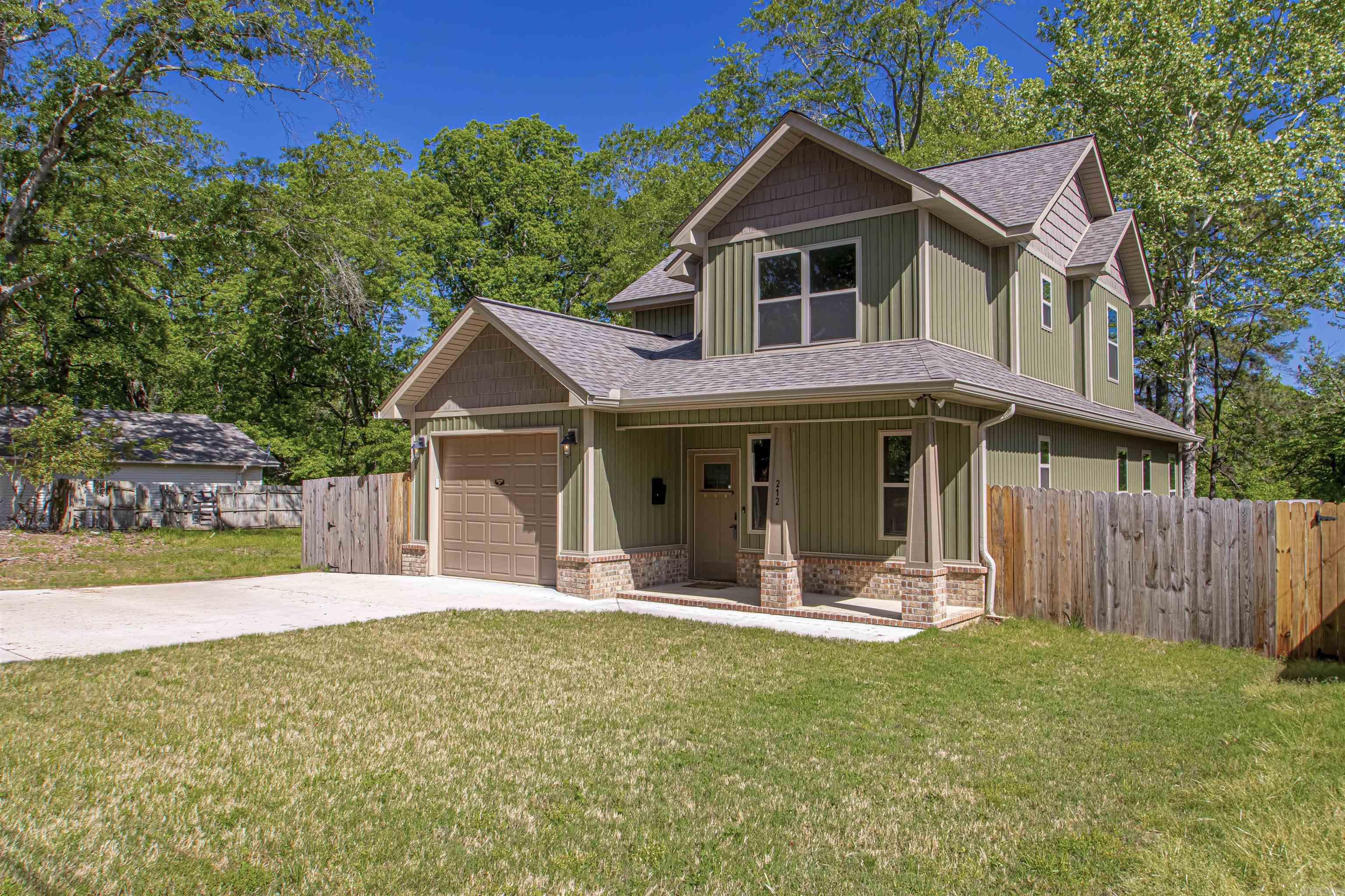 Only two years old*2112 square feet*4 bedrooms*2.5 baths*huge privacy fence backyard*master suite is downstair*master bath has free standing tub, walk-in closet and nice tile shower*gas log fireplace*wonderful kitchen with quartz counters, soft close drawers, gas range and huge breakfast bar*no carpet in the house-luxury vinyl planking*walk-in attic*at only a $141 a sq ft defiantly makes it worth seeing!