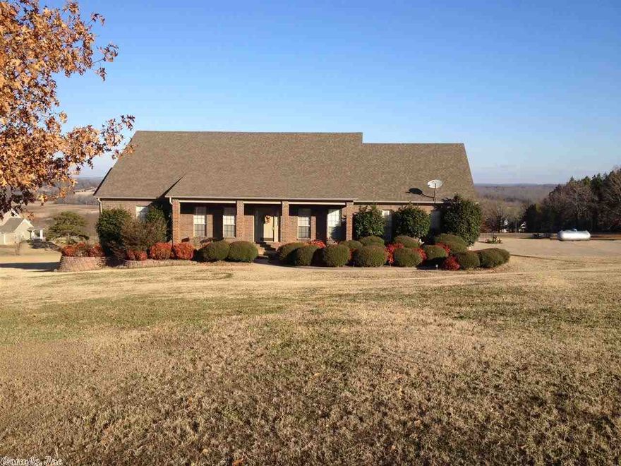 What a View!The perfect family home. 2 sided gas log fireplace between living and kitchen. Viking appliances, 6 burner gas range, & breakfast bar Large dining area and sitting room off kitchen. 3 large bedrooms upstairs and a large bedroom & bath downstairs. Would also make a great game room. Extra trim, vaulted and box ceilings. Security system, Large Decks, 3.15 acres, Wooster schools, popular subdivision, and 3 gas log fireplaces. 6 inch walls. Wired and ready for RV, perfect spot wired for hot tub too!