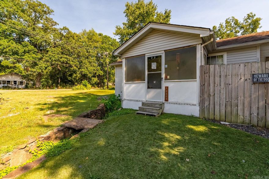 Welcome to this exceptional investment opportunity! This property boasts a strategic location and a multitude of features that make it a prime choice for savvy investors. Situated on an expansive area spanning 4 lots, the potential for growth and income generation is truly remarkable.  The main dwelling offers a 1-bedroom and 1-bathroom layout, providing comfortable living space for the owner or a potential tenant. Attached to the main home is a convenient studio unit, offering flexibility and additional rental potential. This configuration is ideal for maximizing rental income or providing housing options for different types of tenants.  As you explore the property further, you'll discover a spacious storage building that adds functionality and convenience. This versatile structure can serve a variety of purposes, whether it's used for storing equipment, vehicles, or as a workshop.  Continuing to the rear of the property, you'll find a large studio unit. With its separate entrance and ample space, this unit can be transformed into an attractive rental opportunity, adding another layer of income potential to the property.    Please see agent remarks for more information