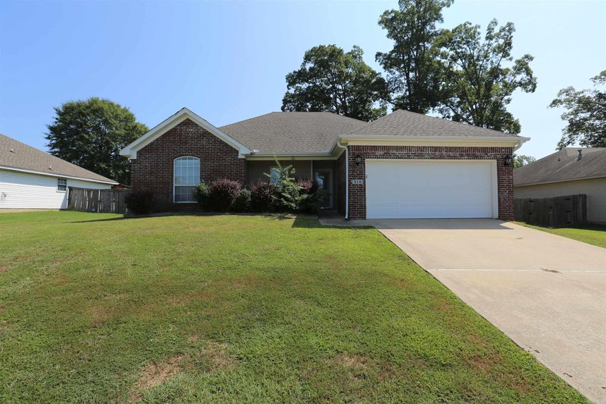 Welcome to 310 Stone Creek Drive, a charming residence in a serene neighborhood of Benton. This 4-bedroom, 2-bathroom home boasts comfortable living spaces, a spacious yard, and modern amenities. With its ideal location, this property won't stay on the market for long! This home is perfect for families and individuals alike, offering a peaceful retreat while remaining close to schools, parks, and everyday conveniences. Key Features: 4 Bedrooms, 2 Bathrooms -Generous Yard Space -Modern Kitchen - Cozy Living Room - Attached Garage.