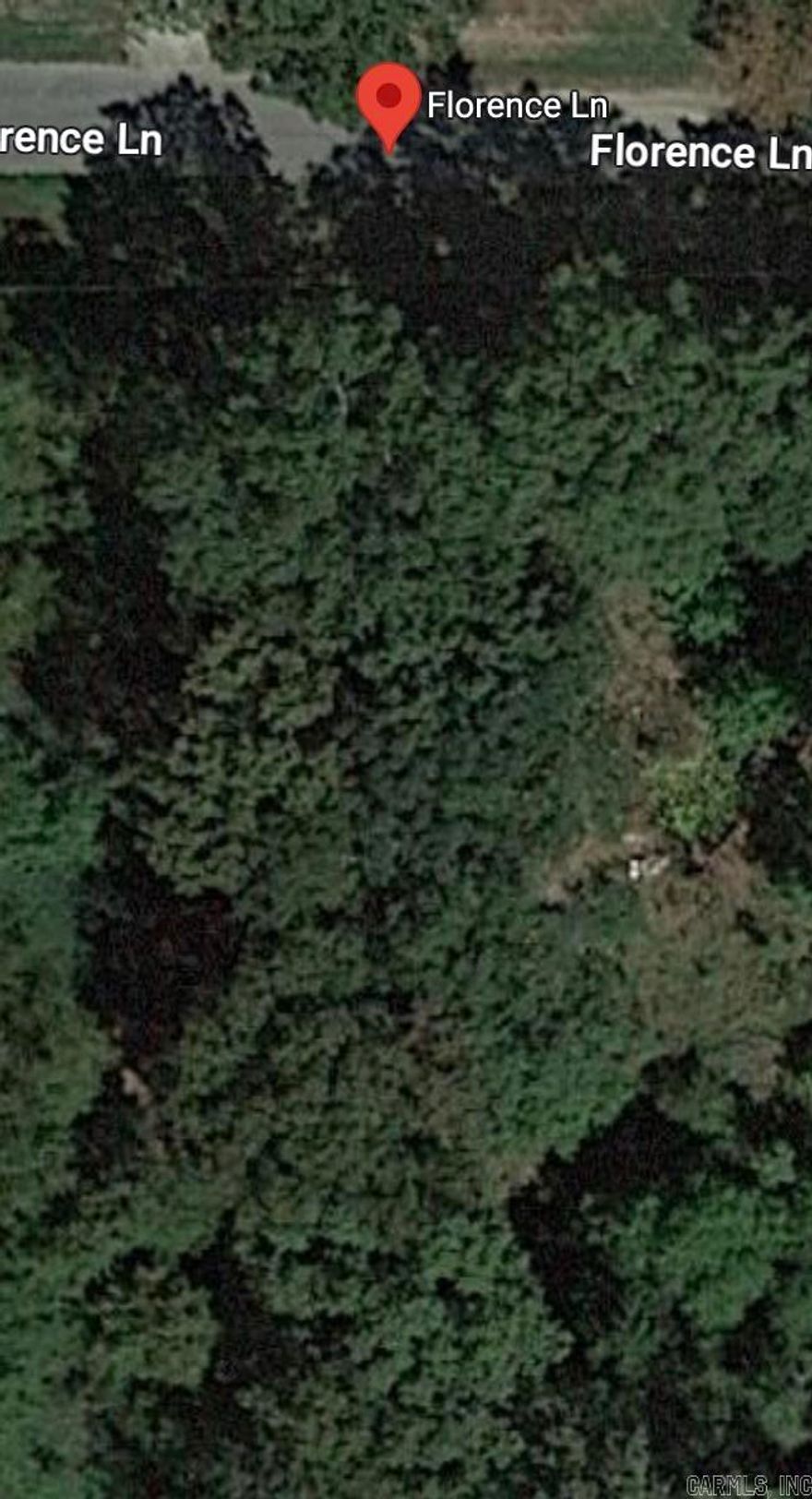 Wooded Vacant lot in Jet City Subdivision. .23 acres.  No survey available.