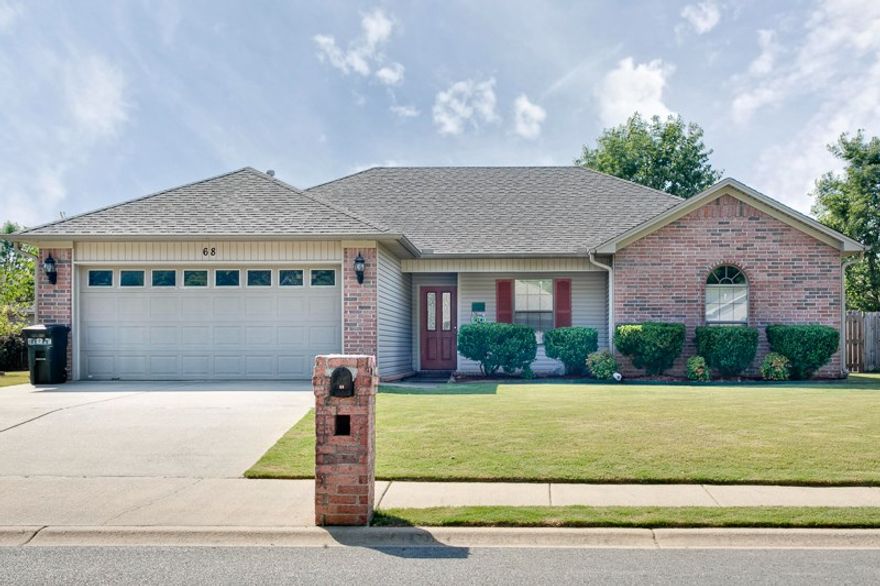 Super cute home in great neighborhood!  Kitchen is spacious with plenty of cabinets and counterspace and a brand new dishwasher too!  Lovely living area features a tray ceiling and a cozy corner fireplace.  All new carpet and 2" blinds thru -out in 2013.  Freshly painted.  Built in desk area w/cabinets makes perfect computer space.  Garage is big enough for two cars and a built in work bench too!  Large fenced backyard!