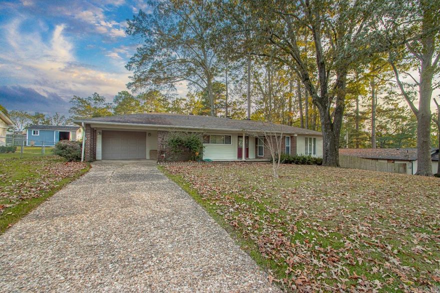 Welcome to this charming ranch-style home in the heart of Benton, located just minutes from Howard Perrin Elementary! With 3 cozy bedrooms, 1.5 bathrooms, and an abundance of storage throughout, this home offers both comfort and convenience for families or those looking to downsize with style. As you step inside, you’re greeted by a spacious and inviting living room featuring a beautiful fireplace—perfect for cozy nights in or entertaining guests. The neutral colors throughout the home create a serene and easy-to-customize canvas, allowing you to make it your own with minimal effort.The kitchen offers plenty of space for meal prep and casual dining, and the attached dining area flows effortlessly into the living room, making the layout perfect for both family time and gatherings with friends. This home is perfect for anyone looking for the ideal mix of comfort, storage, and location—close to schools, parks, and all the amenities Benton has to offer, while still offering the peace and tranquility of a quiet residential neighborhood. Whether you’re starting a family or just looking for a cozy retreat, this home is ready to welcome you!