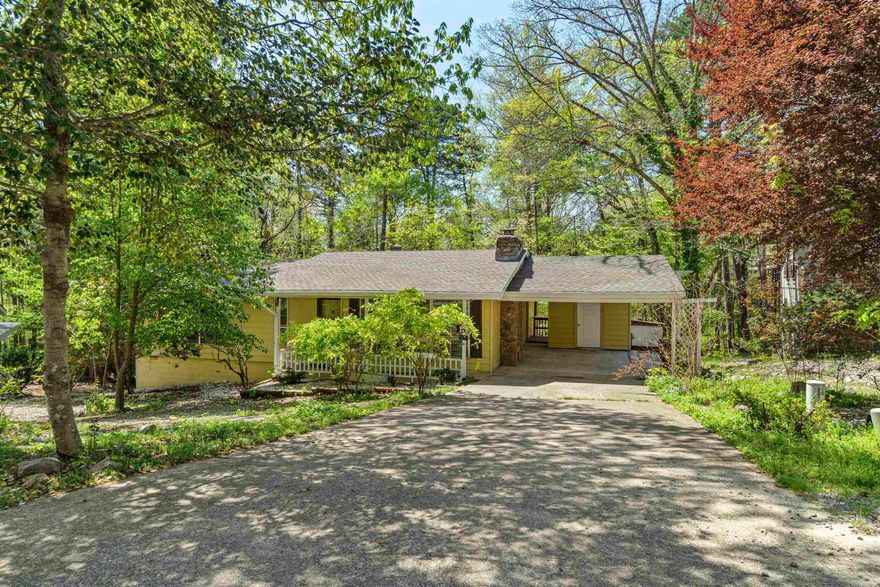 Charming 2 bedroom, 2 bath home featues an inviting layout with functional updates throughout, including refreshed flooring, paint, and fixtures that give it a clean, modern feel while retaining its orignal charm.  The home also includes a large Arkansas room - perfect for added living space!  A unique feature is the separtely accessed thrid bedroom and full bath, ideal for hosting guests or creating a private in-law suite.  Downstairs is a versatile bonus room which offers even more flexibility for storage or hobby use.  Square footage is based on the main level and does not include the 3rd bedroom and full bath.  Don't miss the fenced in backyard and storage room off the carport.  Come see all that this updated property has to offer! Updates include a new architectural roof and heat pump.