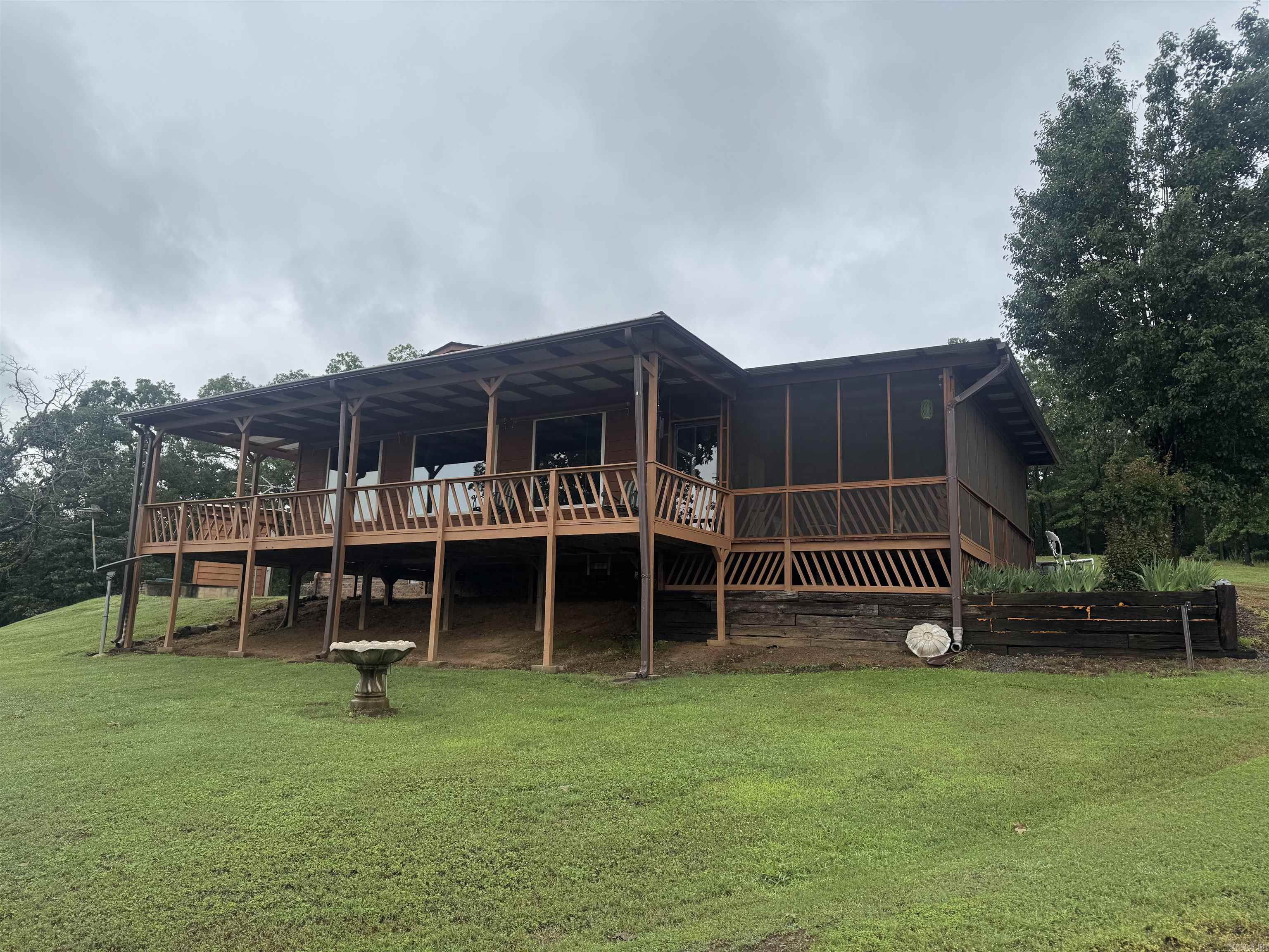 Discover a peaceful retreat on 44± acres with this beautifully maintained 3-bedroom, 2-bath manufactured home. The spacious floor plan includes a cozy sunroom addition perfect for enjoying the natural surroundings year-round. Additional features include a large shop and detached garage, providing ample space for hobbies and storage. Take in the serene water views from your private property, ideal for outdoor activities or simply relaxing. More pictures coming soon!!