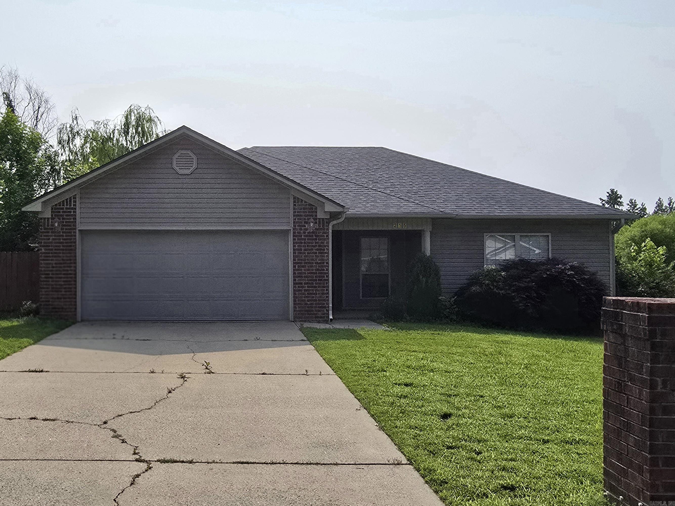 Don't miss this home! 3 bedroom, 2 bath, split floor plan, beautiful laminate flooring throughout with tile in bathrooms and laundry room. Primary bedroom with trey ceiling and walk-in closet, nice sized back yard, storage building and privacy fence! Refrigerator conveys to Buyer!