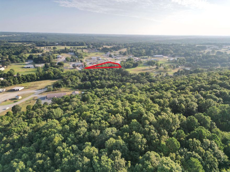 This 1.7-acre commercial lot sits at one of the busiest intersections in Rose Bud, Arkansas. With 6,000 to 8,000 cars passing daily this property offers exceptional visibility and traffic. Located next to Sonic and directly across from a service station, it's surrounded by established businesses. The lot is flat, open, and easy to develop, making it ideal for a wide range of commercial uses. Don't miss this rare opportunity in the heart of town.