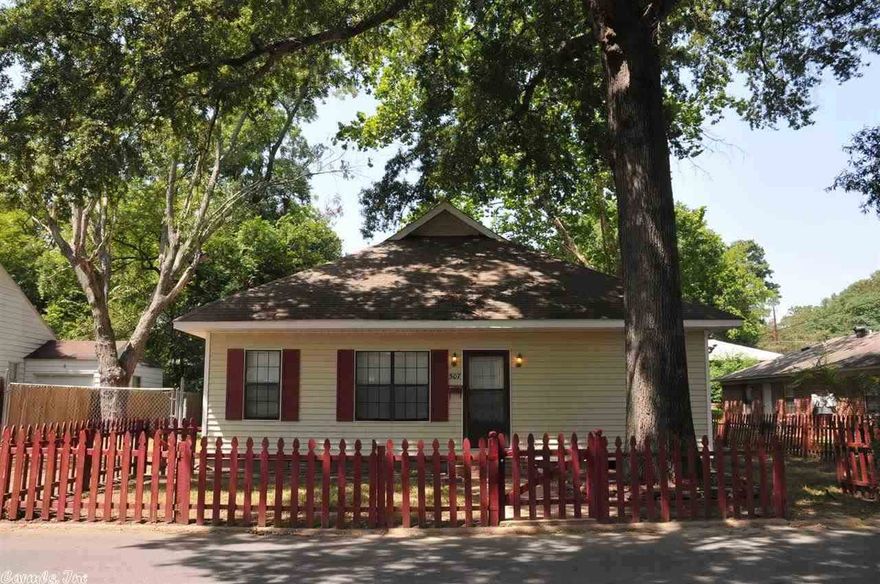 Remodeled nice 3BR/2BA home.  Updated floors, paint, etc. Fenced in back yard. Dog kennel in back yard.  Nice storage building in back.  Walking distance to schools.  Vinyl siding on exterior.  Separate Laundry Room.  Great buy for the money!