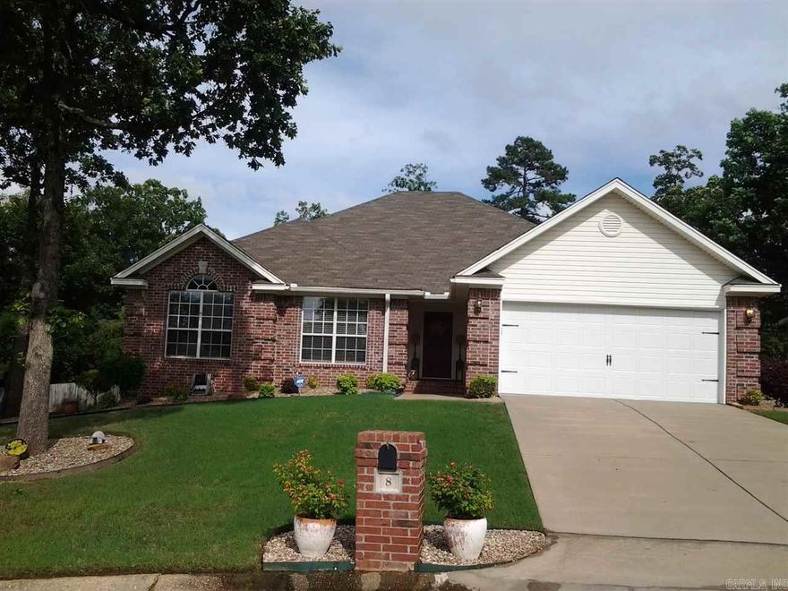 This one will take your breath away...".Mint" Condition, Custom Fireplace, Absolutely Beautiful fixtures and a great buy. Solid floors, No Carpet. Built as a 1793 sq. ft.. 3/2 one level., Professionally enclosed sunroom H/C boost footage to 2132 overall. No Maintain. back yard. Front & Back Beautifully landscaped, & well groomed.  Large Master Suite, a grand Master Bath with His and Her closets.  Crown moldings, High Ceilings, Split floor plan, great closets, Separate Laundry.  Brick/ Vinyl, A must see.