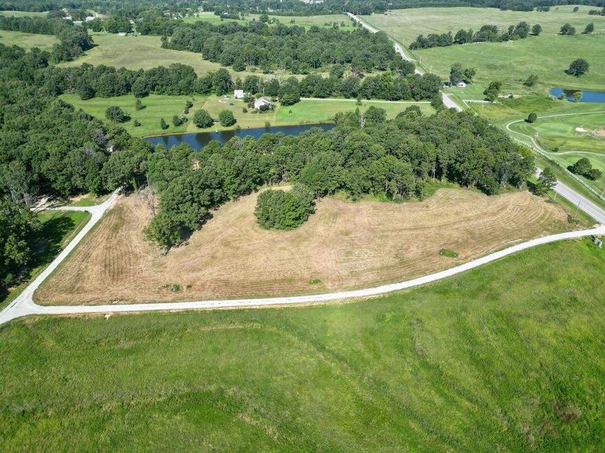 NEW SUBDIVISION in Melbourne! Prime location near the Golf Course and Schools! This lot consists of 5.03 acres with a portion of a large pond and a great view! The land is great for building your dream home! Under ground power and city water is available!  Call for more information!