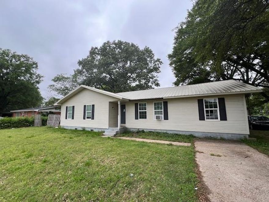 Corner Lot convenience with a Ranch style home. You can step into a living are that has durable tiled floors that opens to an inviting kitchen that features dark rich cabinetry, ample countertop space with a marble look finish. The space is equipped with stainless steel appliances, including a side by side refrigerator, built in microwave, and glass top range. There are three bedrooms, two bathrooms and with a few finishing touches , this property is ready to shine. Agents please see agent remarks
