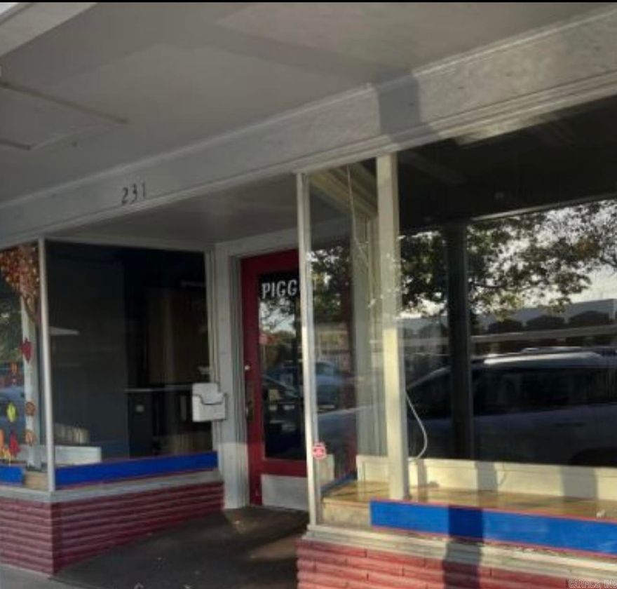 Piggott's Historic Town Square! Commercial Building full of character and charm is conveniently located on Main St. This building has 2258 sq ft, and has high ceilings with beautiful decorative metal. It is stunning and unique to that era in time. Are you looking to start a business or have you outgrown your current business location, or just need additional space? This would make a great option! Come see for yourself this beautiful commercial building located in Piggott, AR.