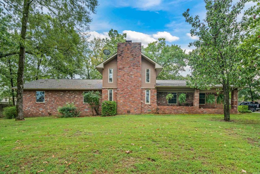 This home offers a perfect blend of comfort and charm with two spacious living areas, two lovely fireplaces, a bonus room, 4 bedrooms, hand scraped hardwood floors, and the den/game room with bar has an icemaker and granite! You will LOVE the space it provides for entertaining an intimate group or large gathering! Ample storage is thoughtfully integrated throughout the house and all is on over an acre! Two covered porches allow for space to enjoy the outdoors! You will LOVE ALL that it has to offer!!!! Buyer will be given right of first refusal to purchase the adjacent lot in conjunction with the purchase of the home.