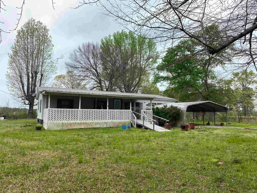3 bed / 2 bath mobile home on 8 acres located just south of Crossett.  Pastureland is cross fenced but will need to be repaired in places and bushhogged. House has not been occupied in over a year. Seller acknowledges Buyer has the right of inspection but property is being sold as-is.  Partial subflooring and flooring recently replaced. Propane space heater in living room will remain.  Walk-in closets in 2 of the 3 bedrooms. Shower/tub combos in both primary and hall bathroom. Split floorplan, formal dining area, breakfast bar in kitchen, laundry room, large living room and full-length covered front porch are few of the desired amenities this home has to offer.  (Electricity is on but off at the breaker.)  With some TLC this could be the peaceful, country living you've been looking for!