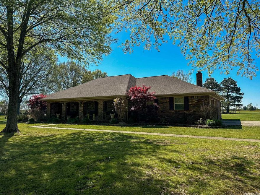 Beautiful, one owner home sitting on 5 acres with Highway frontage on two sides.*Also listed with 17 acres mls#23011306 This property has an abundance of mature trees, 2 shops: 24x24 (with carport) & 32x80 (16x80 lean to).There is even a h/c living area in the larger shop. There is surround sound in the Gazebo and smaller shop (inside & out). Inside you will love the spacious bedrooms, huge kitchen/dining combo and quartz countertops & stainless appliances. The roof & windows were both replaced 3 years ago. This type of property doesn't come available very often! You could also, keep the home and develop the land in smaller tracts. House was sold with 7 Acres