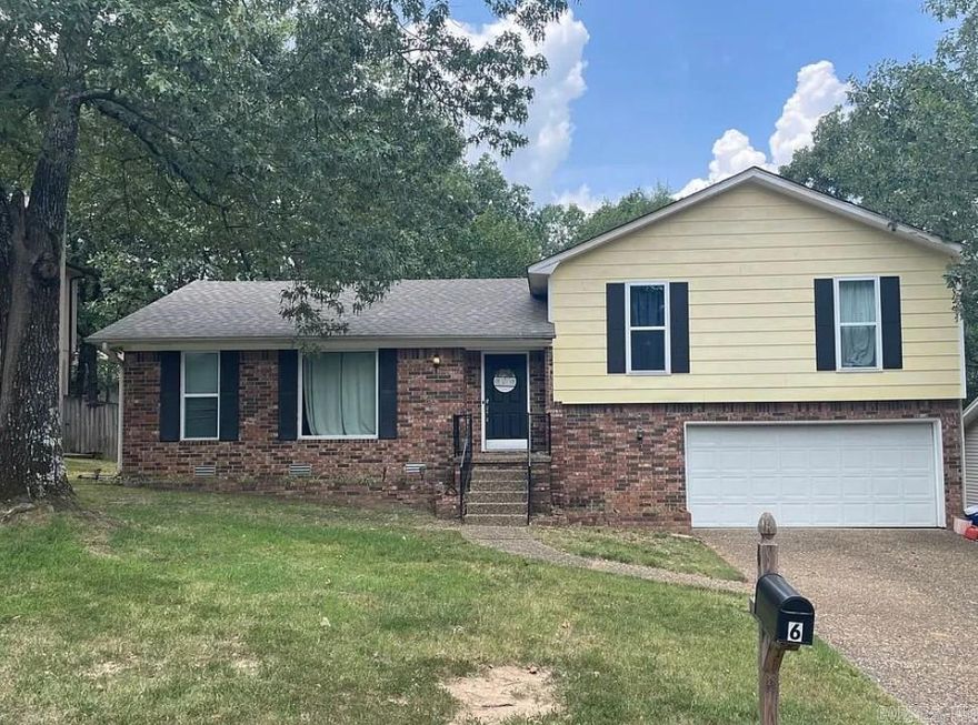 3 bdrm Tri level located in heart of west Little. New Roof and windows in 2021. Livingroom/Dine combo, Sep den opens to the kitchen. Office/Laundry  room down stairs. Laminate and tile flooring.  Gas fireplace place conveys with sale and has never been used.  Sq. Footage is strictly approx- Not measured.   3 decks over look the spacious back yard.