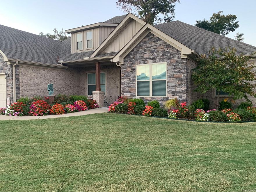 Welcome home to this beautifully appointed 4 bedroom, 2 full bath plus half bath home filled with custom details and thoughtful design. Vaulted ceilings and a cozy gas fireplace create a warm and inviting main living space. The kitchen is a true showpiece featuring a long granite island, a five burner gas cooktop, abundant cabinetry, and an oversized walk in pantry. Just off the pantry is a charming built in nook ideal for a coffee bar, prep station, or extra storage. Formal dining offers the perfect space for hosting, while the eat in kitchen provides everyday convenience. Both full bathrooms feature double sinks and mirrors. The laundry room connects directly to the primary bedroom for added ease. Enjoy beautiful landscaping and a spacious patio perfect for relaxing or entertaining. Additional highlights include a two car garage and a tankless water heater. This home offers comfort, style, and functionality in a desirable Benton location.